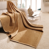 beige camel sofa couch blanket blankets