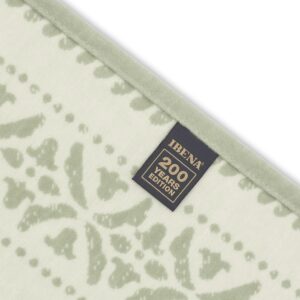 Baumwolldecke grün Ibena 1836.jpg