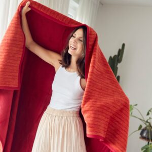 Ibena Fano Sofadecke orange.jpg